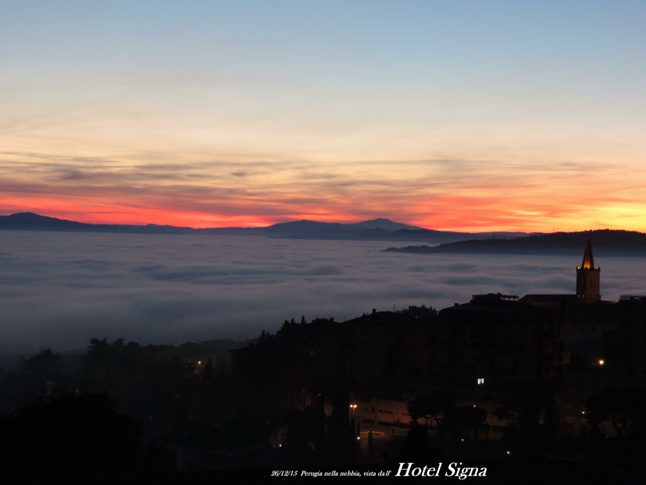 Tramonto nella nebbia